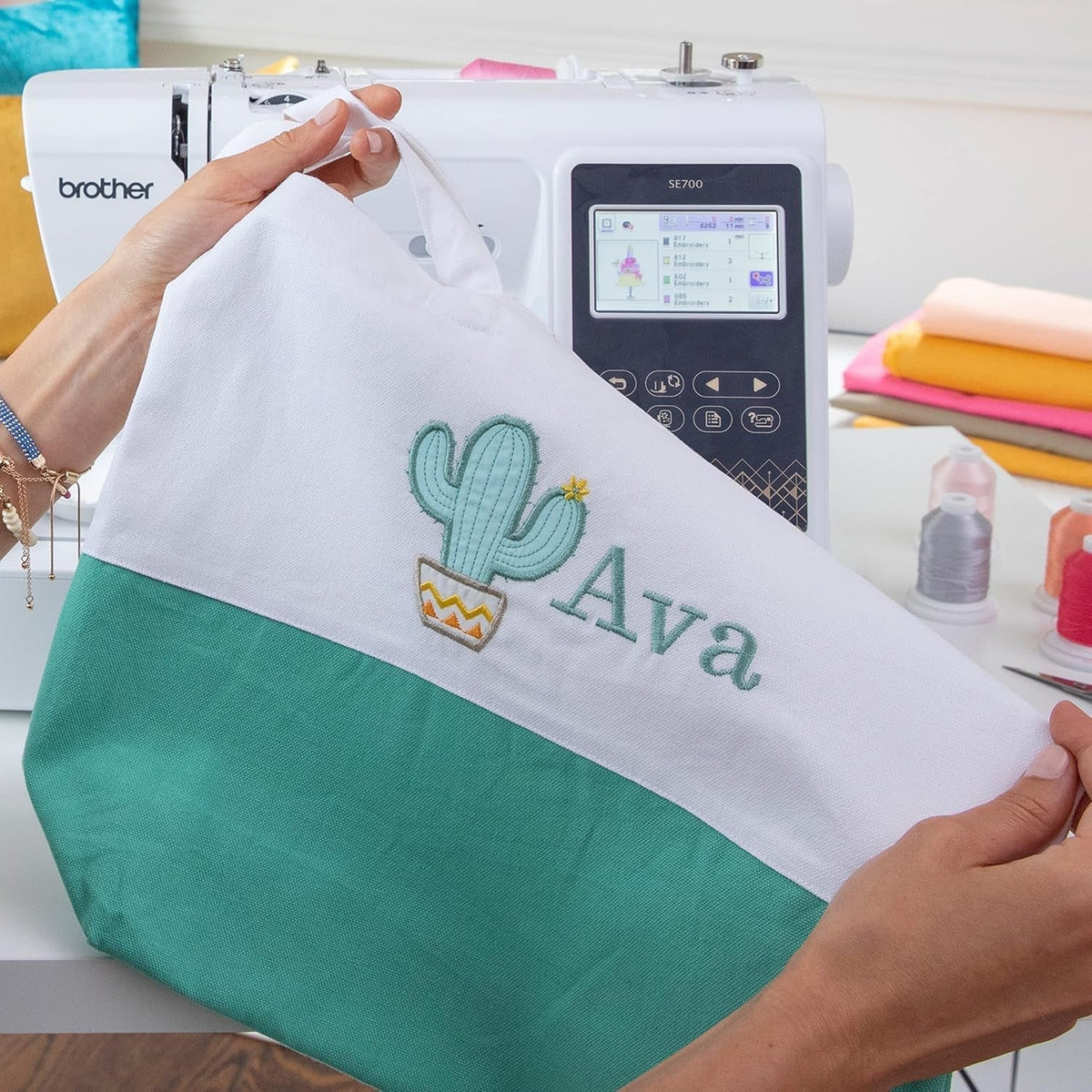 Brother SE700 Sewing and Embroidery Machine, Wireless LAN Connected, 135 Built-In Designs, 103 Built-In Stitches, Computerized, 4" X 4" Hoop Area, 3.7" Touchscreen Display, 8 Included Feet, White
