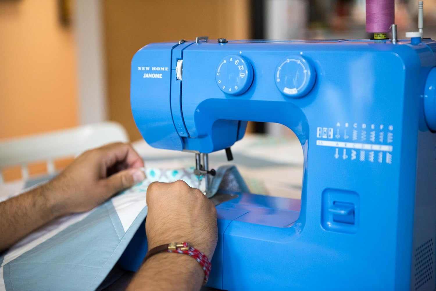 Janome Blue Couture Easy-To-Use Sewing Machine with Interior Metal Frame, Bobbin Diagram, Tutorial Videos, Made with Beginners in Mind!