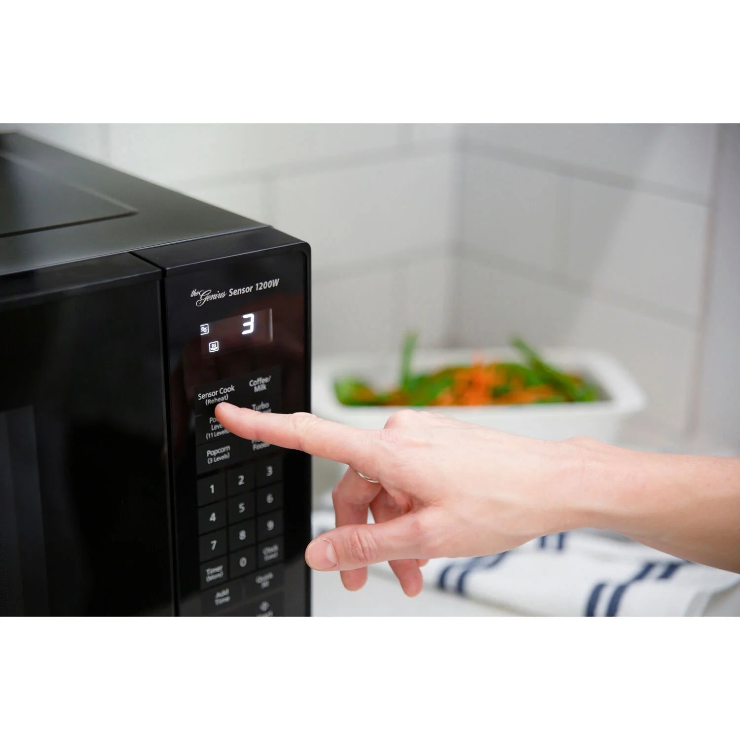 1.2 Cu. Ft. 1200W Genius Sensor Countertop Microwave Oven with Inverter Technology in Black