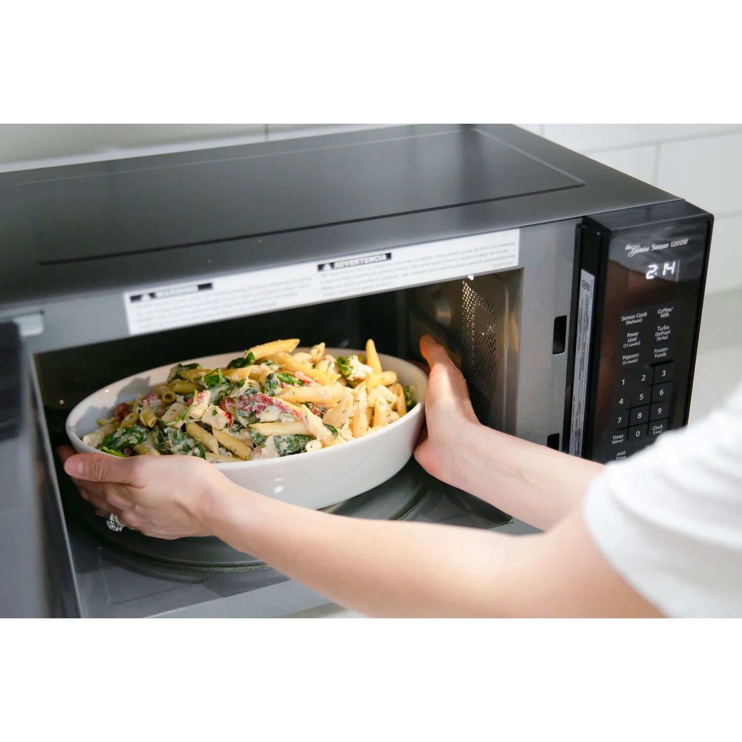 1.2 Cu. Ft. 1200W Genius Sensor Countertop Microwave Oven with Inverter Technology in Black