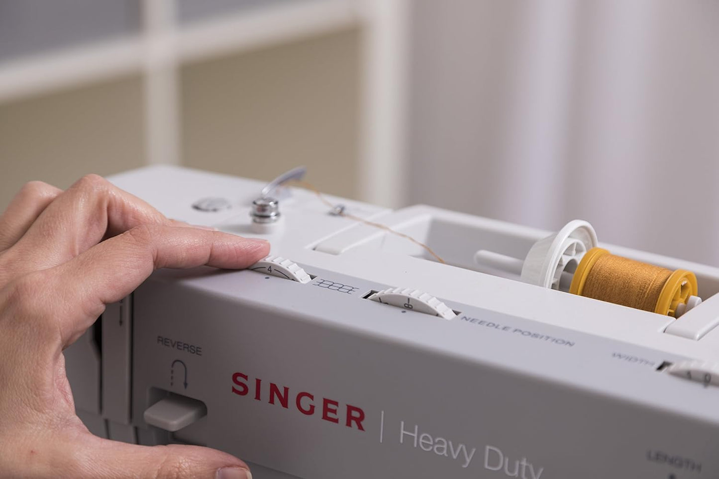 SINGER Heavy Duty 4411 High-Speed Sewing Machine with Accessory Kit | Strong Motor, Enhanced Piercing Power, 69 Stitch Applications, Full Metal Frame, 4-Step Buttonhole & LED Light, Grey