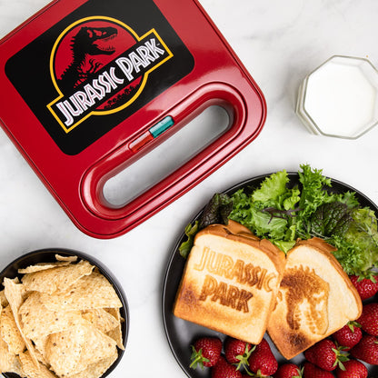 Uncanny Brands Jurassic Park Grilled Cheese Maker- Panini Press and Compact Indoor Grill- Opens 180 Degrees for Burgers