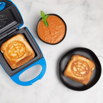 Uncanny Brands Jurassic Park Grilled Cheese Maker- Panini Press and Compact Indoor Grill- Opens 180 Degrees for Burgers