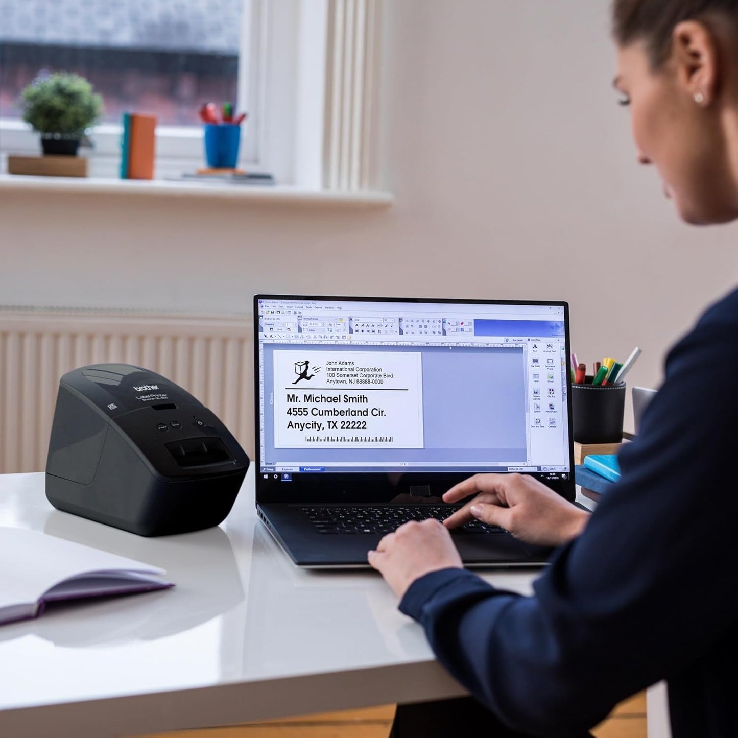 QL-600 Desktop Monochrome Label Printer, up to 2.4" Label Width, No Ink Required, Uses  Genuine DK Drop-In Rolls for Fast Labeling and Easy Integration with Microsoft Applications