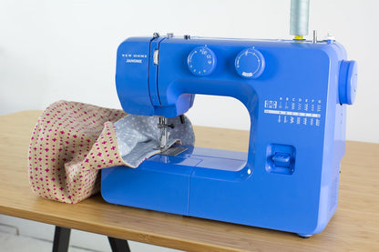 Janome Blue Couture Easy-To-Use Sewing Machine with Interior Metal Frame, Bobbin Diagram, Tutorial Videos, Made with Beginners in Mind!